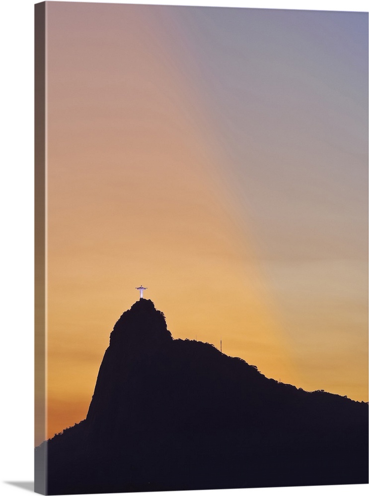 Sunset view of Christ the Redeemer statue and Corcovado Mountain, Rio de Janeiro, Brazil, South America