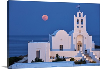 Super Moon Rising Behind Chrisopigi Monastery On Sifnos Island At Dusk, Cyclades, Greece