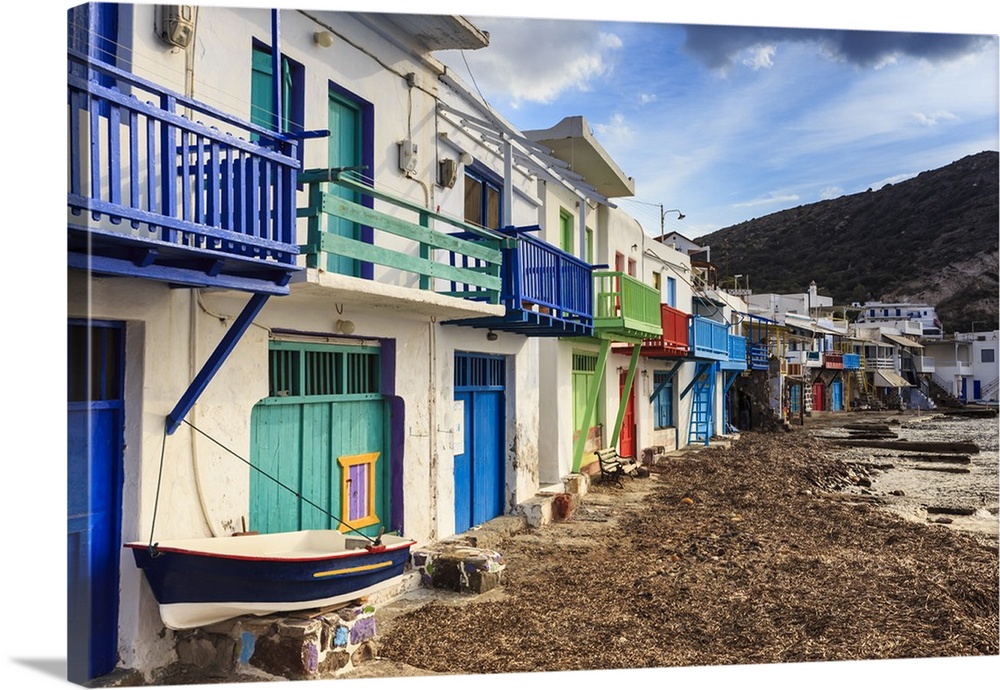 Syrmata, traditional fishermen's encampments with brightly painted woodwork, fishing village of Klima, Milos, Cyclades, Gr...