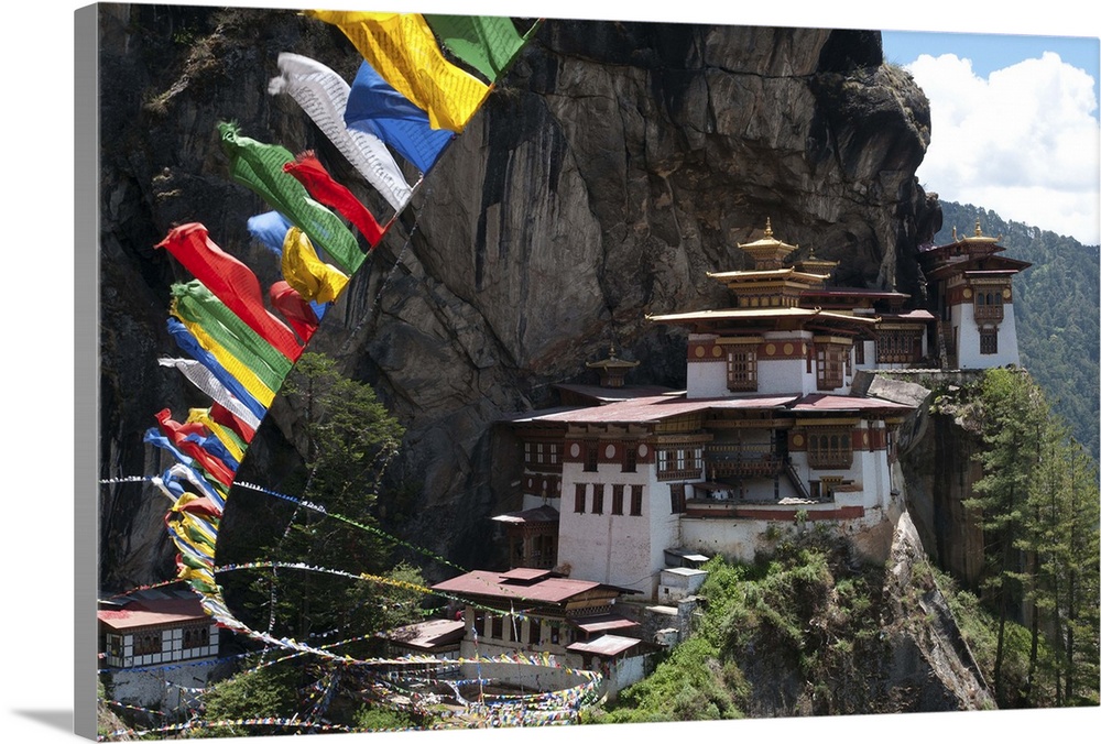 Taktshang Goemba with prayer flags and cliff, Paro Valley, Bhutan