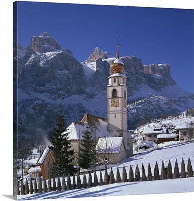 The church and village of Colfosco in Badia, Trentino Alto Adige, Italy