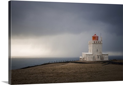 The Lighthouse Of Dyrholaey On A Stormy Day, Southern Coast Of Iceland