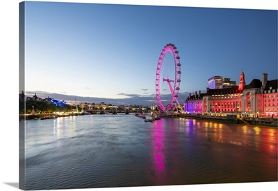 The London Eye Lit Up Pink During Blue Hour, And River Thames, London, England