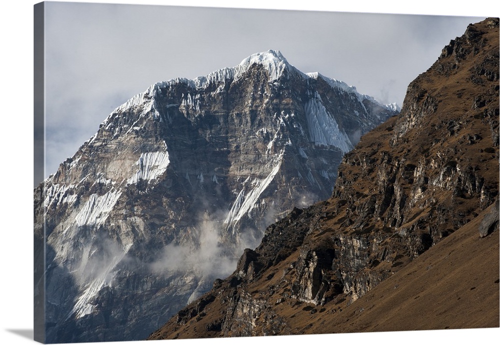The looming face of Jomolhari, the third highest mountain in Bhutan at 7326m, seen from Jangothang, Bhutan, Himalayas