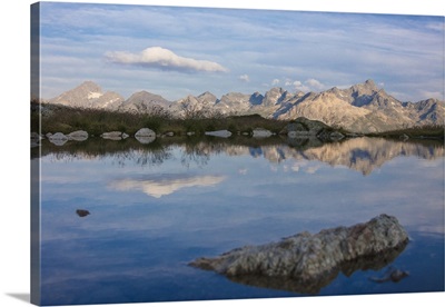 The sky is reflected in the alpine lake, Muottas Muragl, Samedan, Engadine, Switzerland