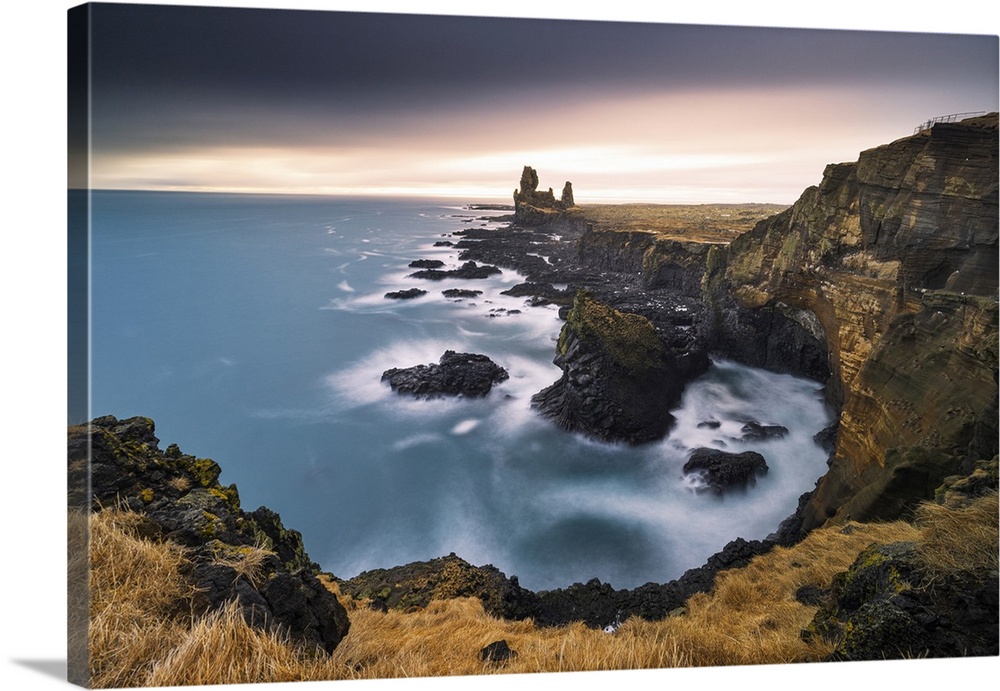 The splendid basalt rock cliff of Londrangar, taken with a long exposure on a cold winter day, Iceland, Polar Regions