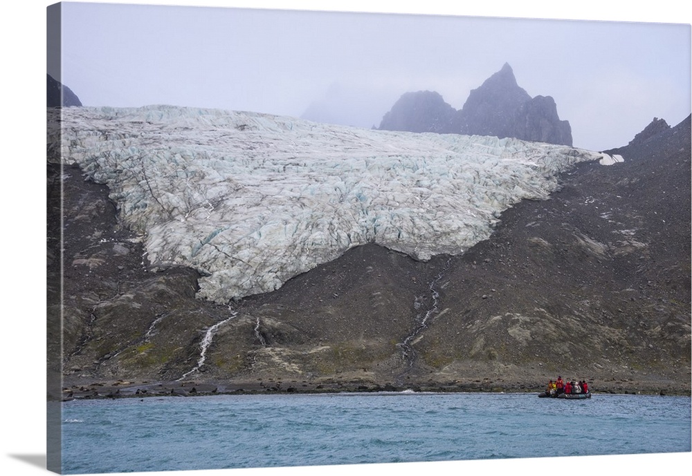 Tourists on a zodiac watching a glacier on Elephant Island, South Shetland Islands, Antarctica, Polar Regions