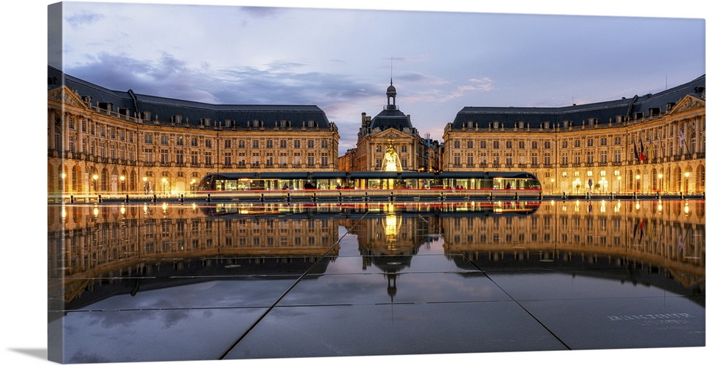 Tram at the Miroir D'Eau, Place de la Bourse, at blue hour, Bordeaux, Gironde, Aquitaine, France, Europe