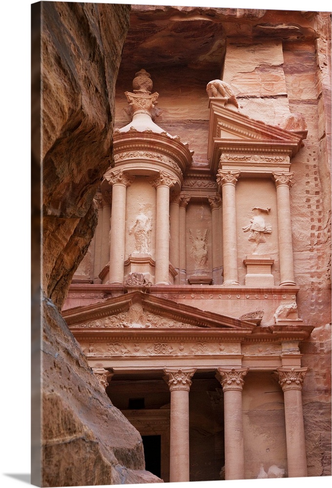 Treasury carved into the red rock with the Siq in the foreground, Petra, Jordan