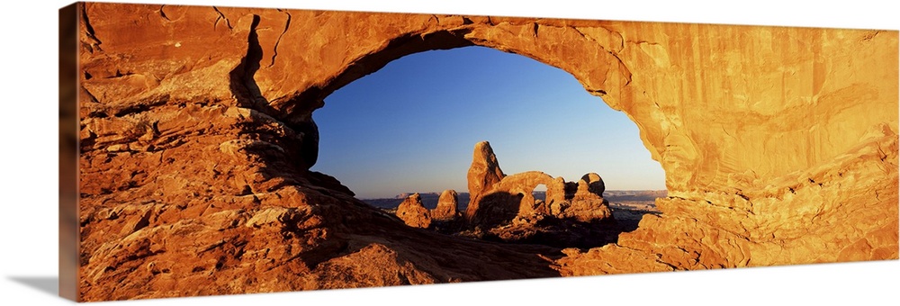 Turret Arch through North Window at sunrise, Arches National Park, Moab, Utah