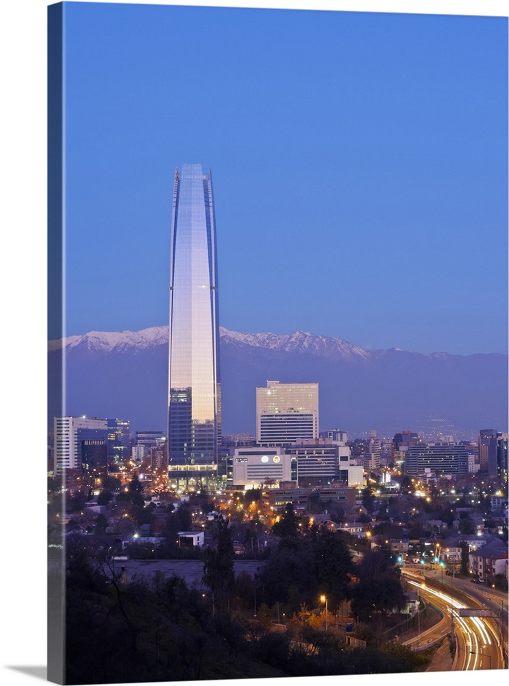 Twilight view from the Parque Metropolitano towards the high raised buildings with Costanera Center Tower, Santiago, Chile...