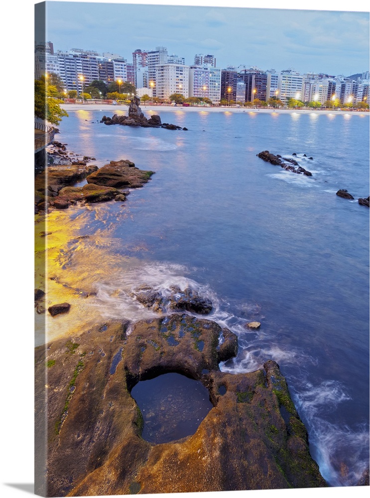 Twilight view towards Icarai Beach with skyline of Niteroi, Niteroi, Rio de Janeiro, Brazil, South America