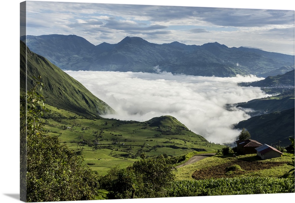 Valley filled with cloud in Andes central highlands, hiding the Nariz del Diablo railway below Chunchi, Ecuador, South Ame...