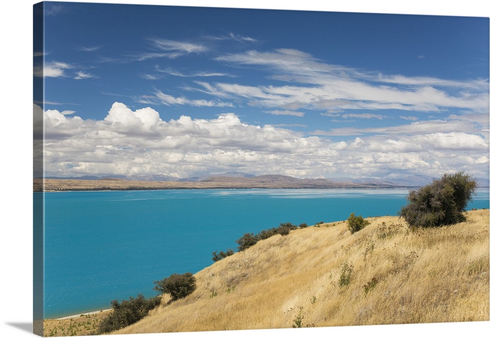 View across the turquoise waters of Lake Pukaki, near Twizel, Mackenzie district, Canterbury, South Island, New Zealand, P...