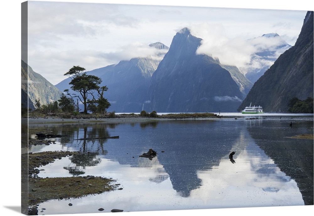 View down Milford Sound, mountains reflected in water, Milford Sound, Fiordland National Park, UNESCO World Heritage Site,...