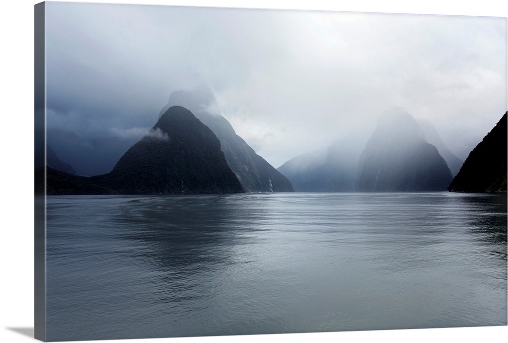View down rainswept Milford Sound, mountains obscured by cloud, Milford Sound, Fiordland National Park, UNESCO World Herit...