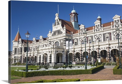 View from gardens to the imposing facade of Dunedin Railway Station, Anzac Square