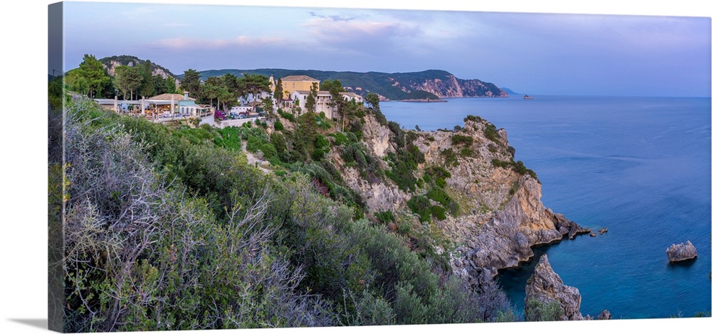 View of coastline from Monastery of Paleokastritsa at sunset, Palaiokastritsa, Corfu, Ionian Sea, Greek Islands, Greece, E...