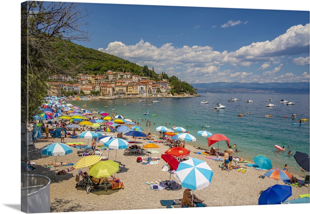 View of beach and the town in the background in Moscenicka Draga, Kvarner Bay, Eastern Istria, Croatia, Europe