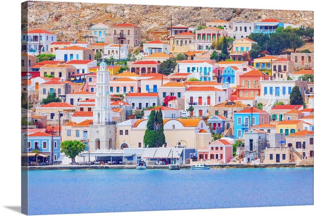 View of Emporio harbour and Saint Nicholas church in the distance, Emporio, Halki Island, Dodecanese Islands, Greek Island...