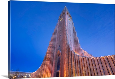 View Of Hallgrimskirkja Church Illuminated At Dusk In Winter, Reykjavik, Iceland