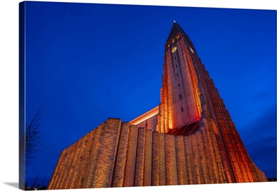 View Of Hallgrimskirkja Church Illuminated At Dusk In Winter, Reykjavik, Iceland