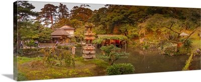 View Of Hisago-Ike Pond And Kaiseki Pagoda In Kenrokumachi Japanese Garden, Japan