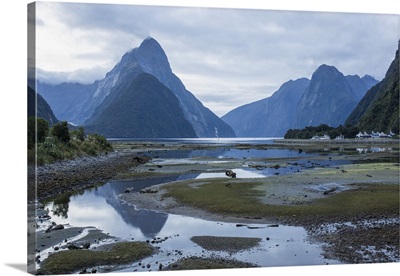View of Milford Sound at low tide, Mitre Peak reflected in pool, Milford Sound