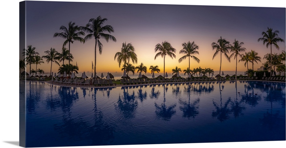 View of sunrise and hotel pool near Puerto Morelos, Caribbean Coast, Yucatan Peninsula, Mexico, North America