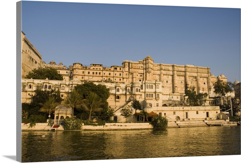 View of the City Palace and hotels from Lake Pichola, Udaipur, Rajasthan, India