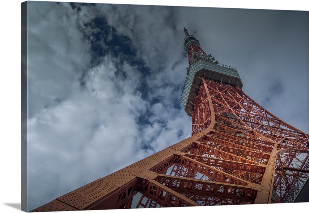 View of Tokyo Tower from its base against cloudy sky, Shibakoen, Minato City, Tokyo, Honshu, Japan