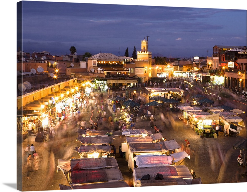 View over Djemaa el Fna at dusk with foodstalls and crowds of people, Marrakech, Morocco, North Africa, Africa