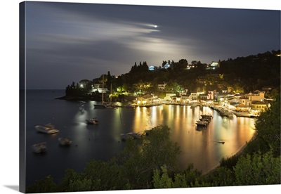 View over harbour at night, Loggos, Paxos, Ionian Islands, Greek Islands, Greece