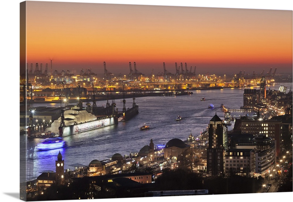 View over St. Pauli district and St. Pauli Landungsbruecken pier over the harbour at sunset, Hamburg, Hanseatic City, Germany