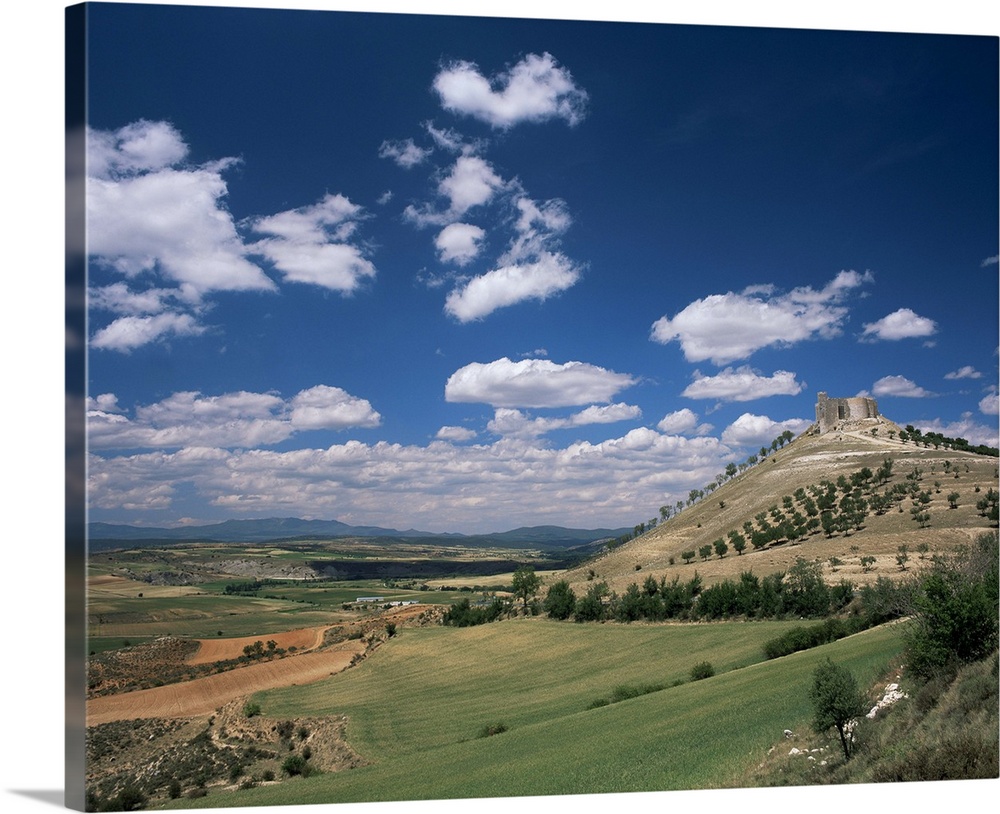 View to castle on hill above fields, Jadraque, Guadalajara, Castilla-La Mancha Spain