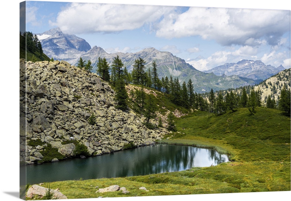 Wairasee mountain lake (Lake Waira) with meadows and summits of the Swiss Alps, Valais, Switzerland, Europe