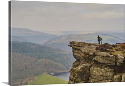 Walkers taking in the view on Hathersage Edge, Peak District National Park