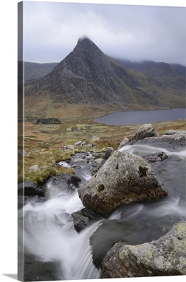 Water cascading down a fall on the Afon Lloer, overlooking the Ogwen Valley and Tryfan