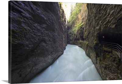 Water of creek flows in the narrow limestone gorge, Aare Gorge, Switzerland