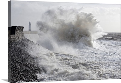 Waves Crash Against The Harbour Wall At Porthcawl, Bridgend, Wales