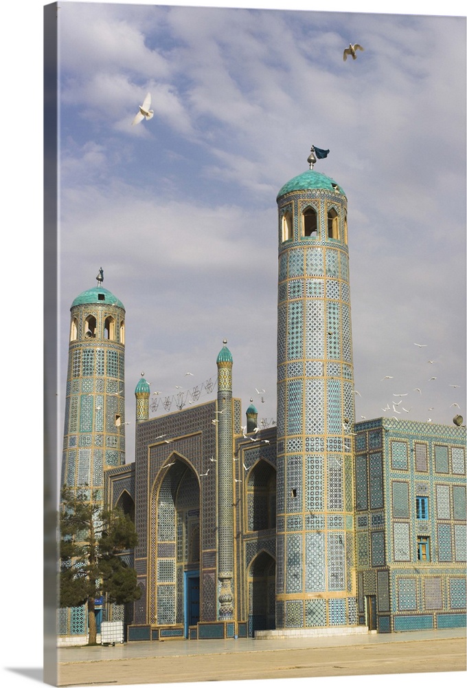 White pigeons fly around the shrine of Hazrat Ali, Mazar-I-Sharif, Afghanistan