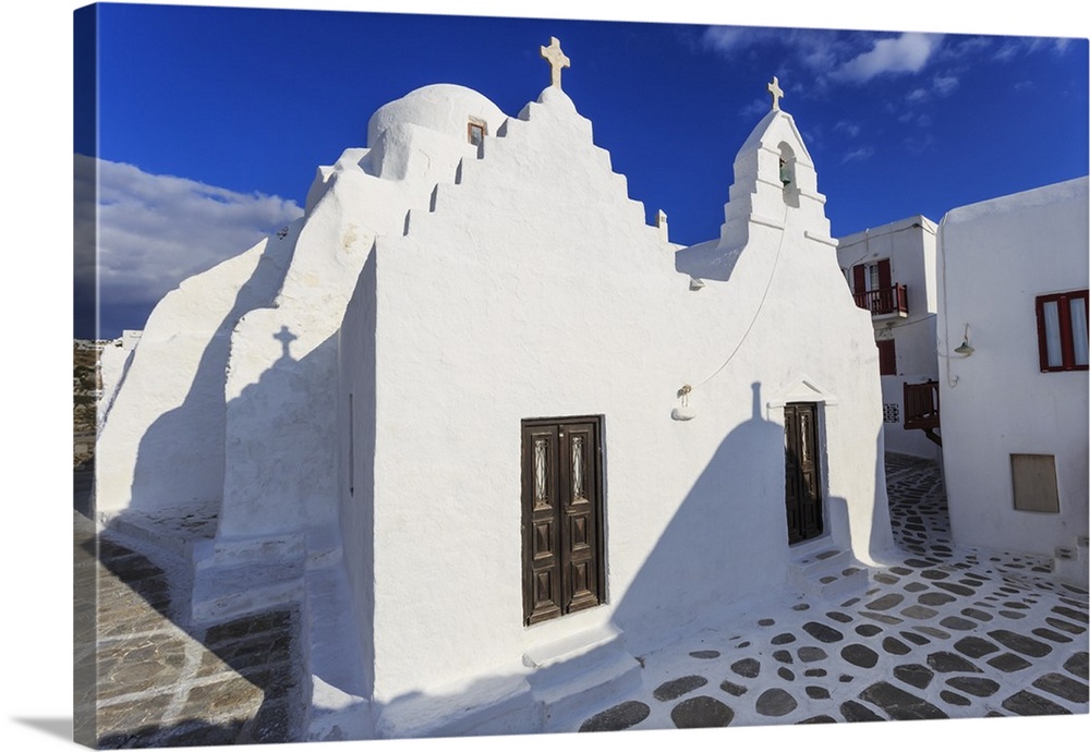 Whitewashed Panagia Paraportiani, Mykonos most famous church, under a blue sky, Mykonos Town, Mykonos, Cyclades, Greek Isl...