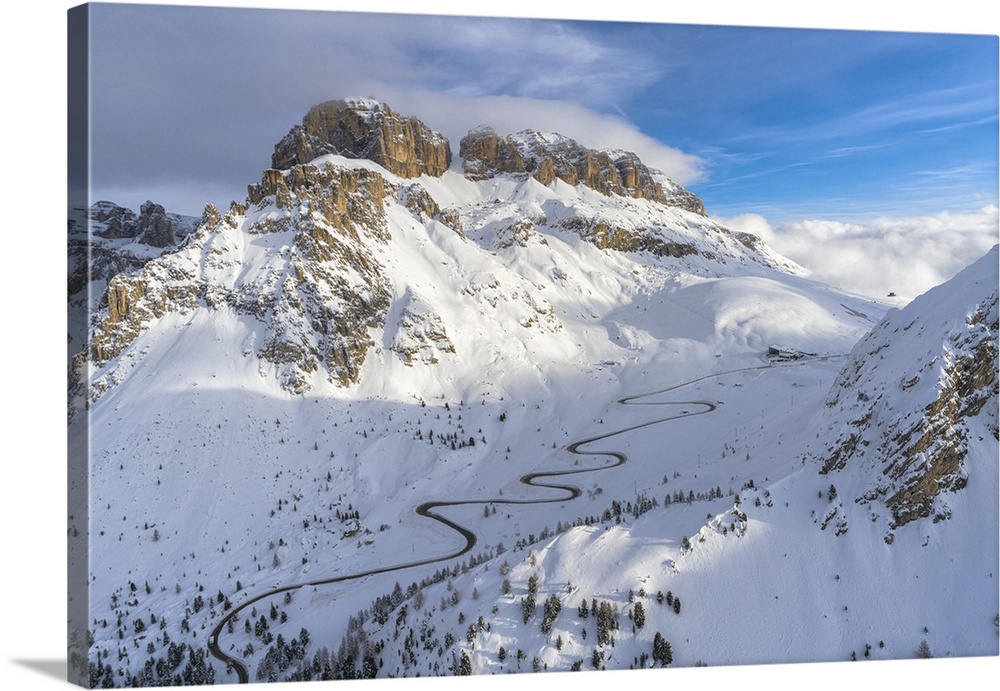 Winding road in the snow, aerial view, Pordoi Pass, Dolomites, Trentino-Alto Adige, Italy, Europe