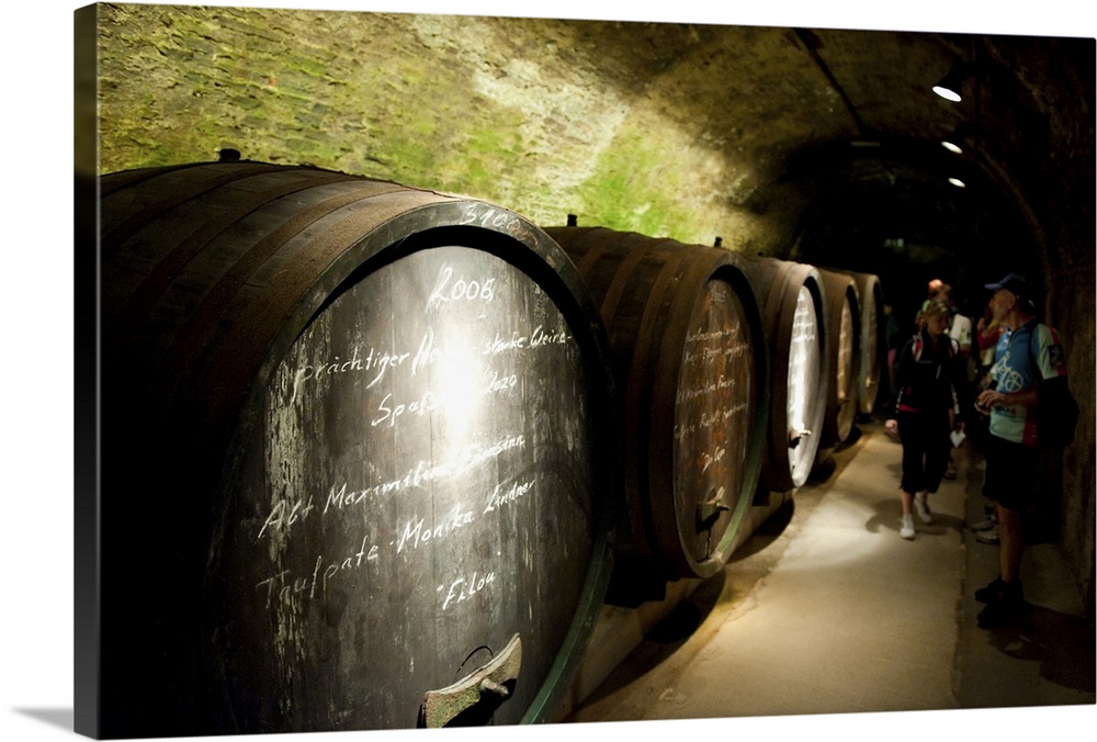 Wine barrels inside cellar of Loisium Winery, Langelois, Niederosterreich, Austria