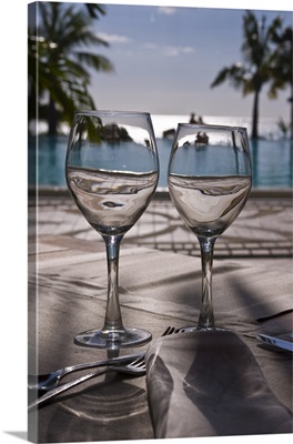 Wine glasses in front of the pool of the Beachcomber Le Paradis, Mauritius, Africa