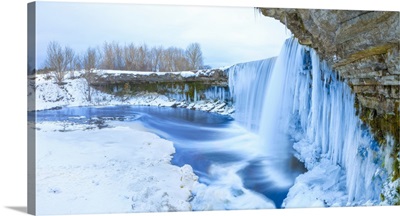 Winter ice covered and snowy waterfall, Estonia