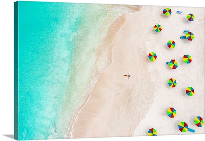 Woman In Bikini Sunbathing On A Tropical Beach, Antigua, Caribbean