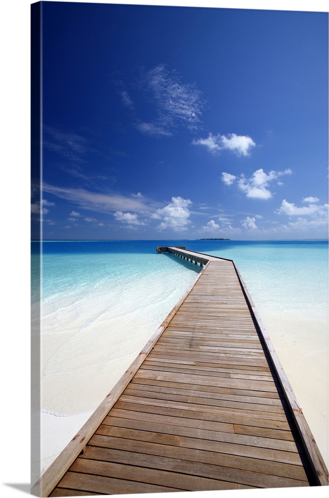 Wooden jetty out to tropical sea, Maldives, Indian Ocean, Asia