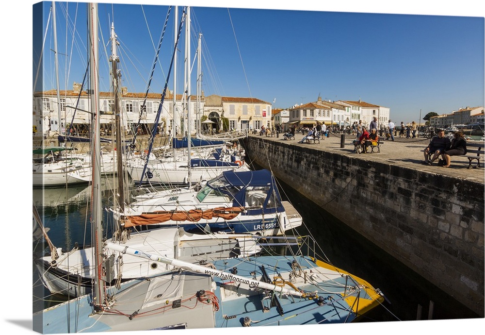 Yachts moored at the Quai de Bernonville in this north coast town, Saint Martin de Re, Ile de Re, Charente-Maritime, France