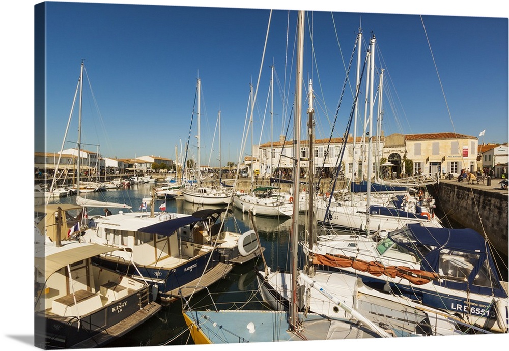 Yachts moored at the Quai de Bernonville in this north coast town, Saint Martin de Re, Ile de Re, Charente-Maritime, France